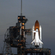 A photo of NASA's Space Shuttle on a launch pad.